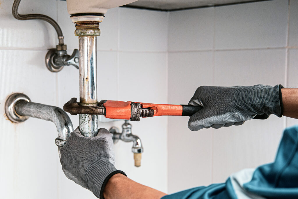 Expert plumber repairing pipe in Anaheim, CA and nearby